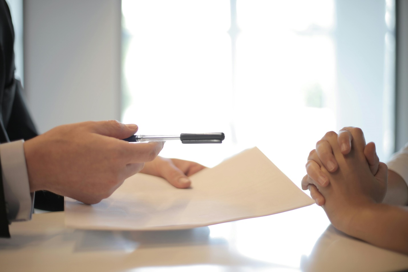 College Interview Coach Holding a Pen