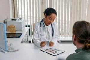 Medical Student Shadowing a Physician in a Clinical Setting